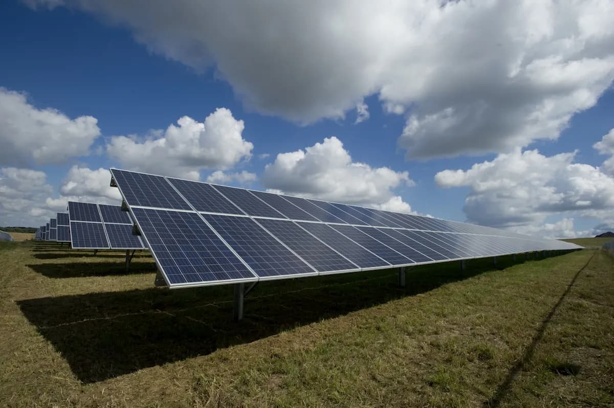 Modern home with solar panels representing renewable energy options